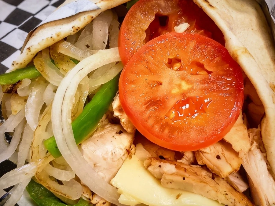 Chicken donair plate at Sal's Famous on 82 St Edmonton - served with fresh toppings and fries